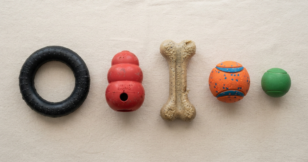 Best Chew Toys for Dogs: A flat-lay of tough chew toys for heavy chewers across rubber and nylon materials.